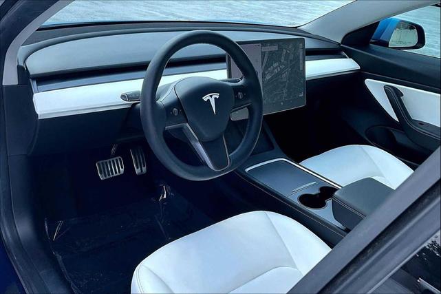 Photo of 2021 Deep Blue Metallic Tesla Model 3