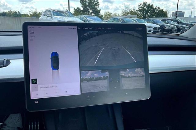 Photo of 2021 Deep Blue Metallic Tesla Model 3