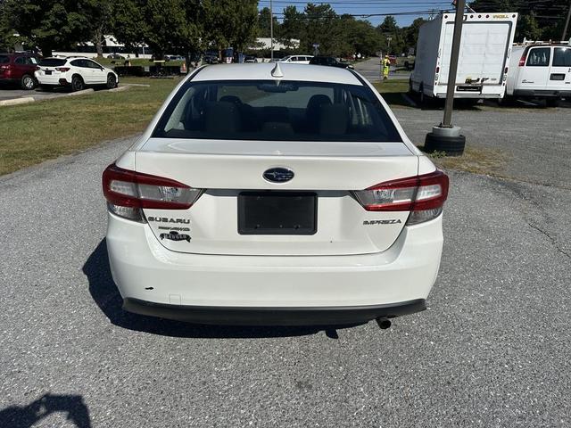 Photo of 2023 Crystal White Pearl Subaru Impreza
