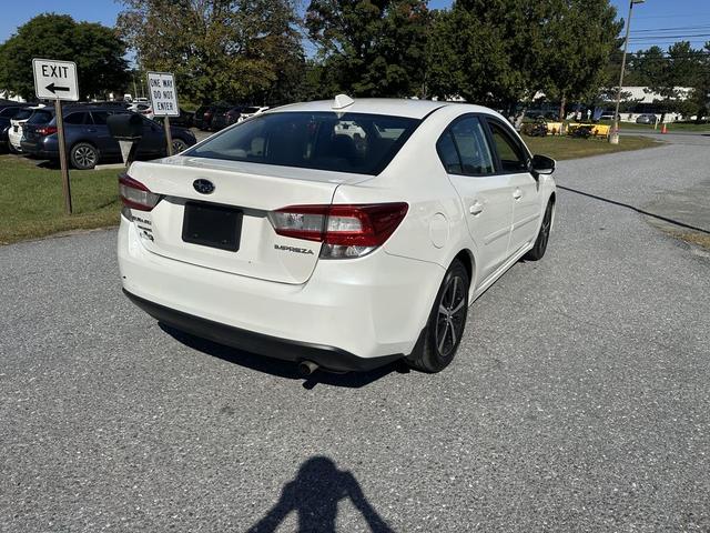 Photo of 2023 Crystal White Pearl Subaru Impreza