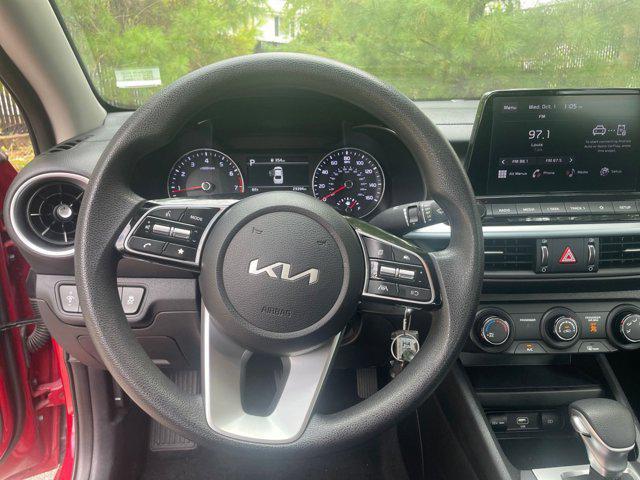 Photo of 2024 Currant Red Kia Forte