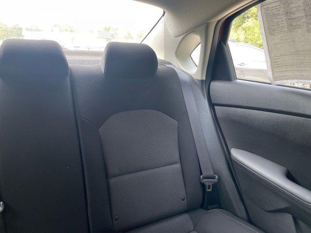 Photo of 2024 Currant Red Kia Forte
