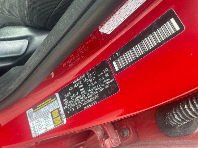 Photo of 2024 Currant Red Kia Forte