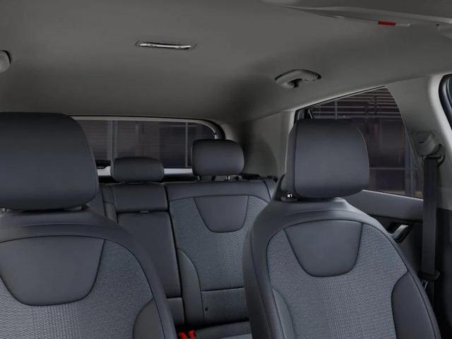 Photo of 2025 Cityscape Green Kia Niro Plug-In Hybrid