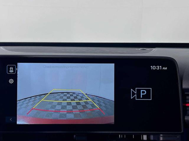 Photo of 2025 Ultimate Red Metallic w/Black Roof Hyundai KONA