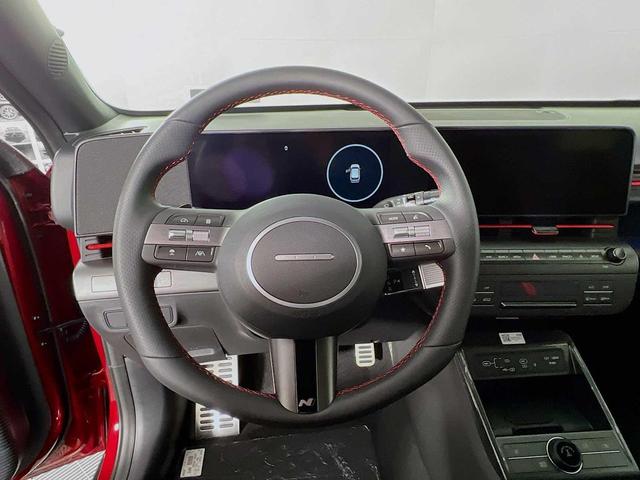 Photo of 2025 Ultimate Red Metallic w/Black Roof Hyundai KONA