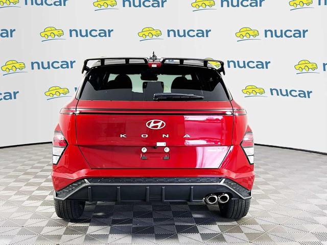 Photo of 2025 Ultimate Red Metallic w/Black Roof Hyundai KONA