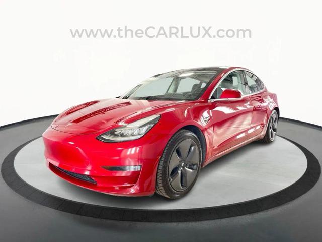 Photo of 2018 Red Tesla Model 3