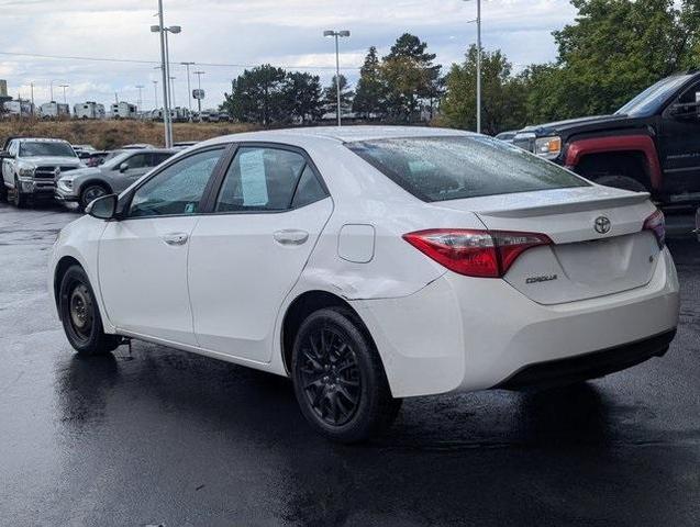 Photo of 2015 White Toyota Corolla