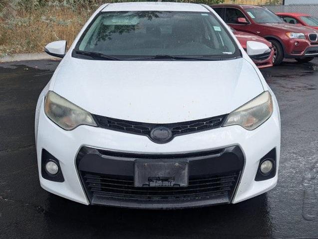 Photo of 2015 White Toyota Corolla