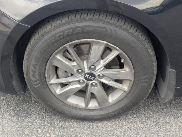 Photo of 2016 Ebony Black Kia Optima