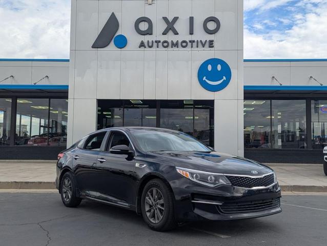 Photo of 2016 Ebony Black Kia Optima