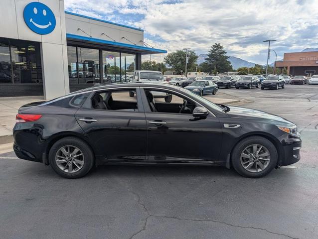 Photo of 2016 Ebony Black Kia Optima