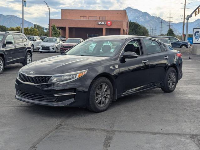Photo of 2016 Ebony Black Kia Optima