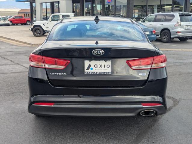 Photo of 2016 Ebony Black Kia Optima
