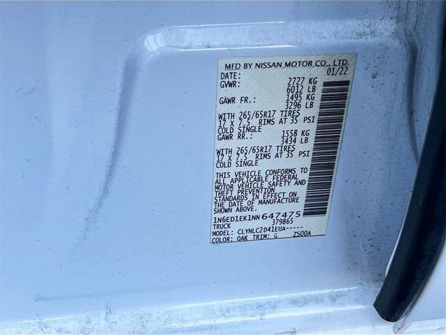 Photo of 2022 Glacier White Nissan Frontier