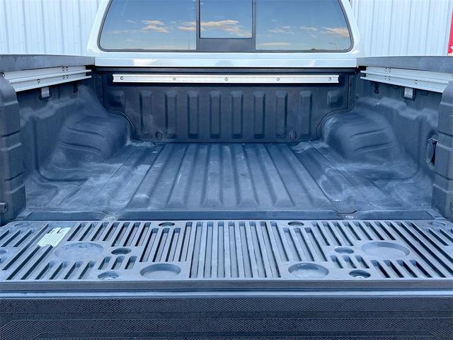 Photo of 2022 Glacier White Nissan Frontier