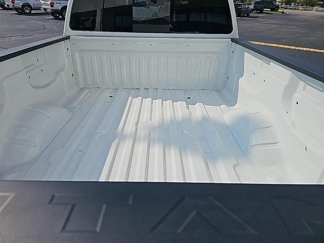 Photo of 2023 Glacier White Nissan Titan XD