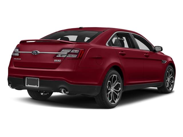 Photo of 2016 Ruby Red Metallic Tinted Clearcoat Ford Taurus