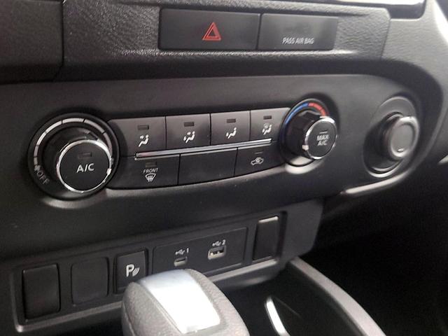 Photo of 2023 White Nissan Frontier