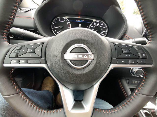Photo of 2025 Aspen White Tricoat/Super Black Nissan Sentra