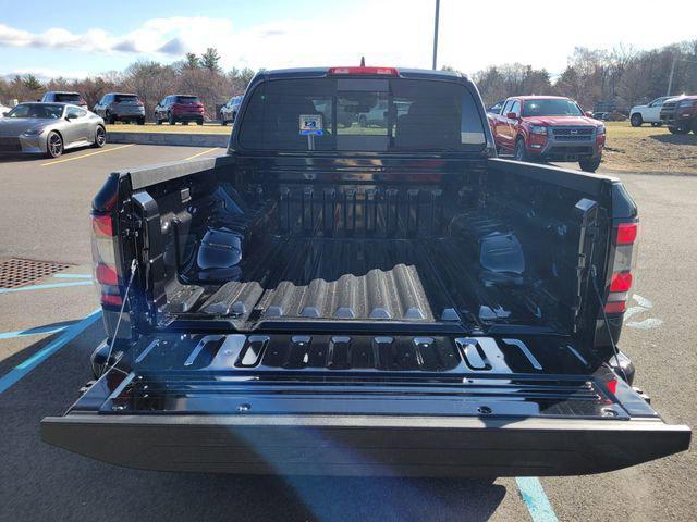 Photo of 2025 Super Black Nissan Frontier