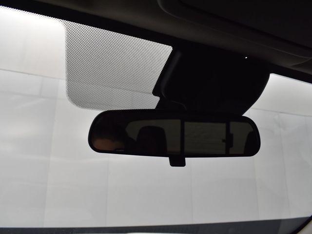 Photo of 2024 Glacier White Nissan Frontier