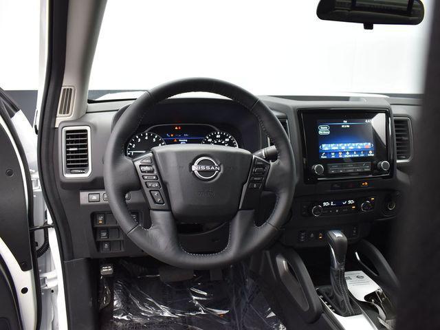 Photo of 2024 Glacier White Nissan Frontier