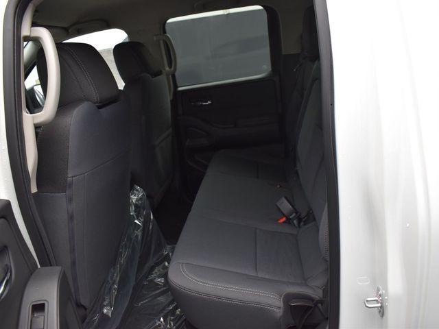 Photo of 2024 Glacier White Nissan Frontier