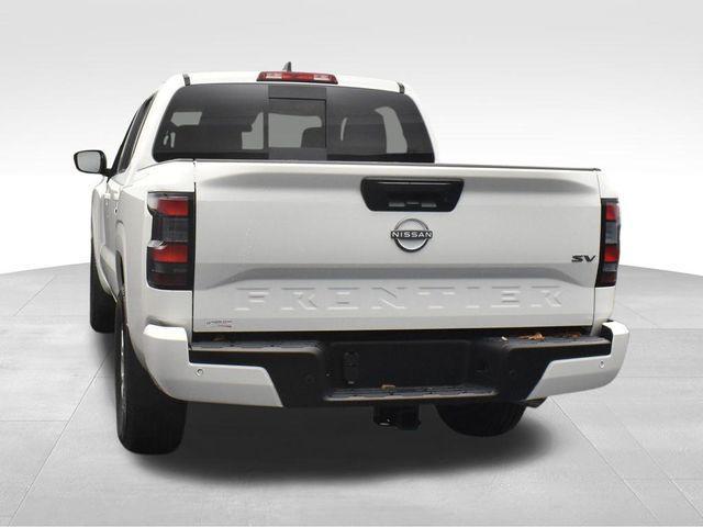 Photo of 2024 Glacier White Nissan Frontier