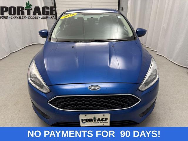 Photo of 2018 Lightning Blue Ford Focus