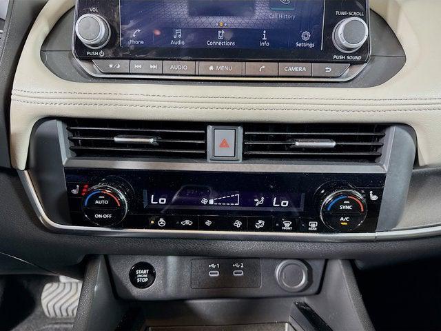 Photo of 2024 Scarlet Ember Tintcoat Nissan Rogue