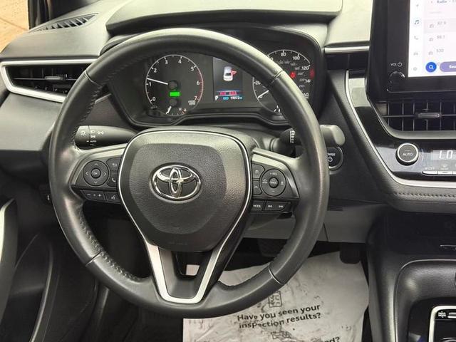 Photo of 2024 Midnight Black Metallic Toyota Corolla Hybrid