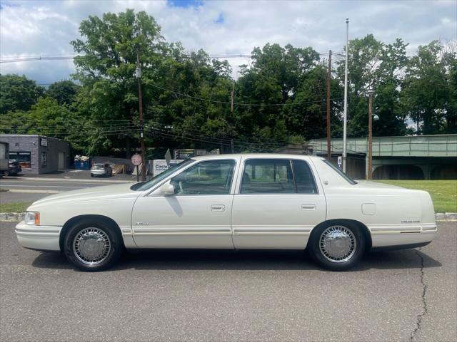 Photo of 1998 White Diamond Cadillac DeVille