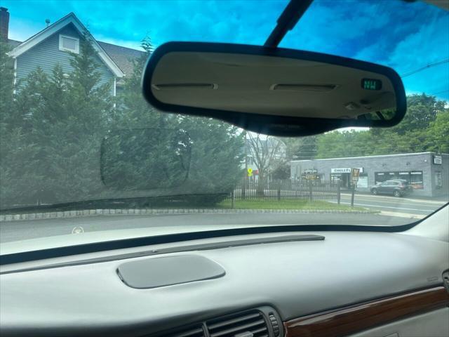 Photo of 1998 White Diamond Cadillac DeVille