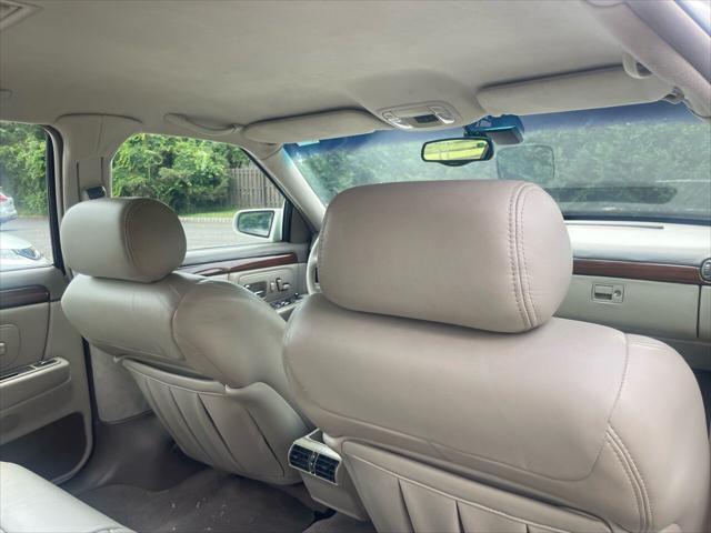 Photo of 1998 White Diamond Cadillac DeVille