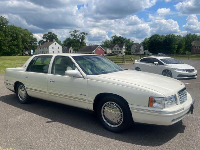 Photo of 1998 White Diamond Cadillac DeVille