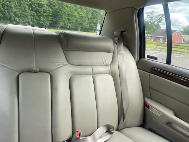 Photo of 1998 White Diamond Cadillac DeVille