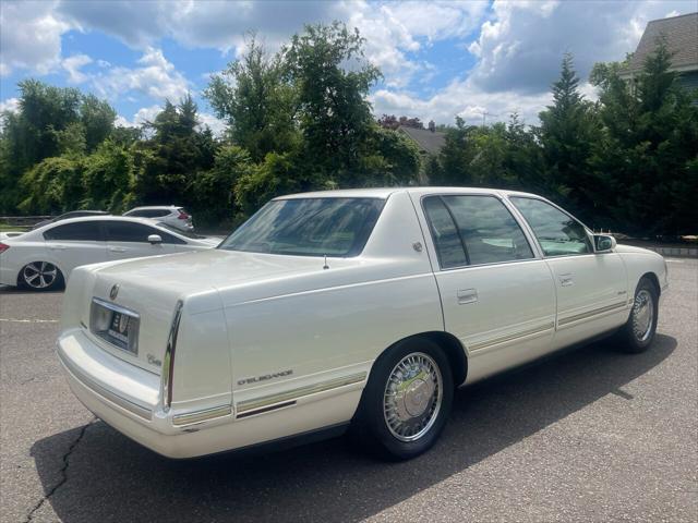 Photo of 1998 White Diamond Cadillac DeVille