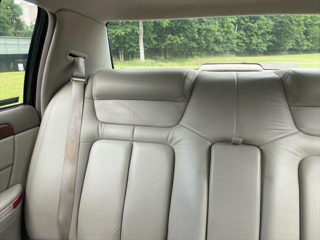 Photo of 1998 White Diamond Cadillac DeVille