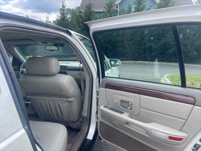 Photo of 1998 White Diamond Cadillac DeVille