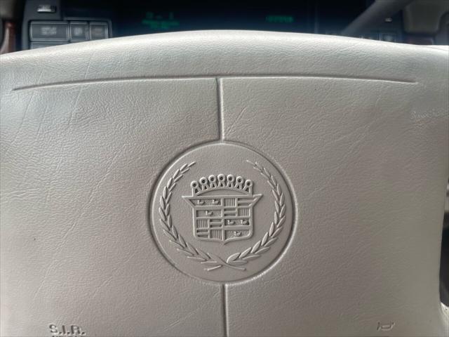 Photo of 1998 White Diamond Cadillac DeVille