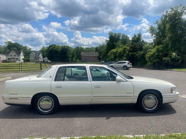 Photo of 1998 White Diamond Cadillac DeVille