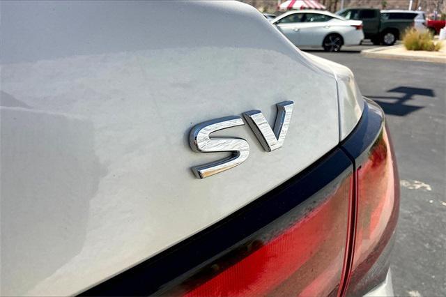 Photo of 2023 Aspen White Tricoat Nissan Sentra
