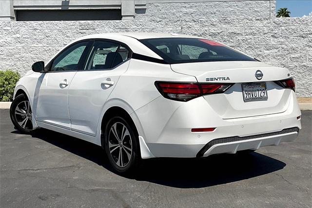 Photo of 2023 Aspen White Tricoat Nissan Sentra