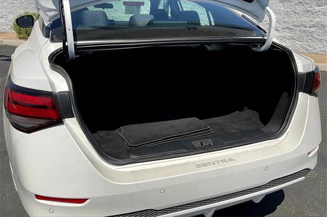 Photo of 2023 Aspen White Tricoat Nissan Sentra