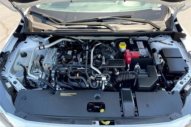 Photo of 2023 Aspen White Tricoat Nissan Sentra