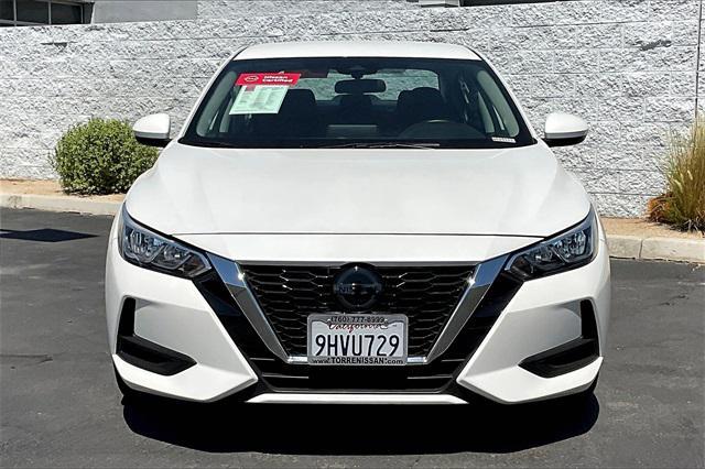 Photo of 2023 Aspen White Tricoat Nissan Sentra