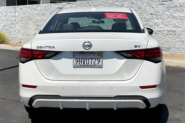 Photo of 2023 Aspen White Tricoat Nissan Sentra