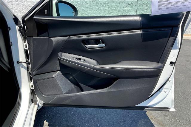 Photo of 2023 Aspen White Tricoat Nissan Sentra